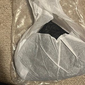 Brand new cute black clutch.